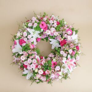Small premium funeral wreath in shades of pink